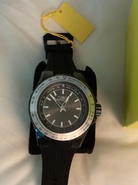Invicta Black Dial Watch with Silver Bezel